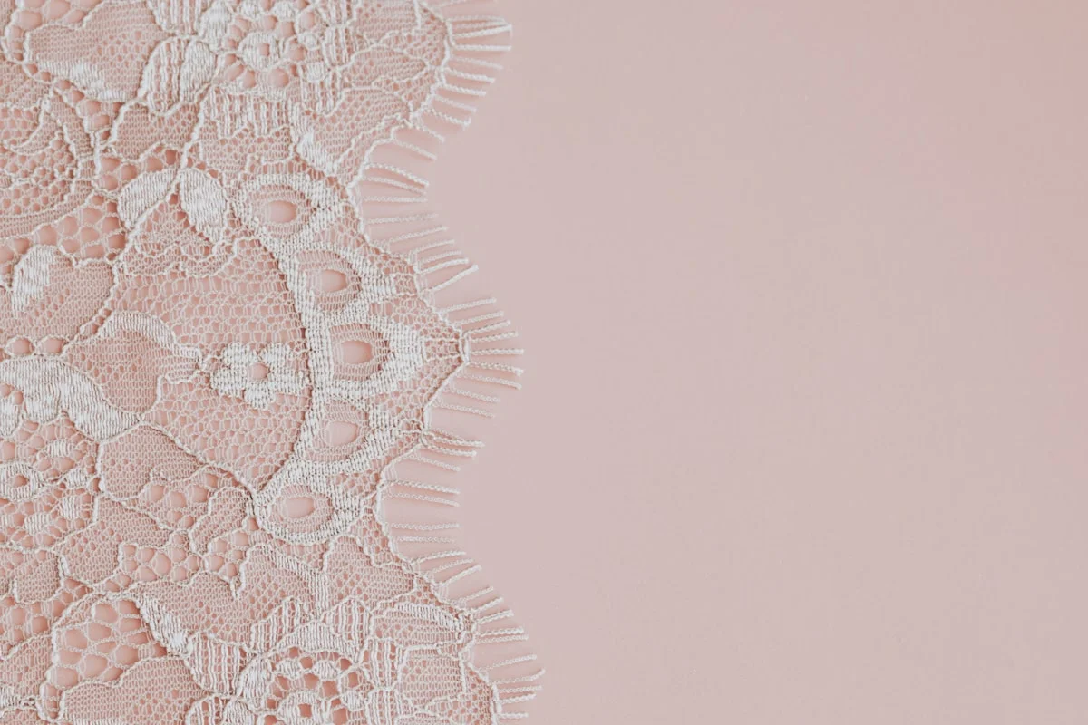 Coquette aesthetic outfit with pink lace, bows, and delicate feminine details