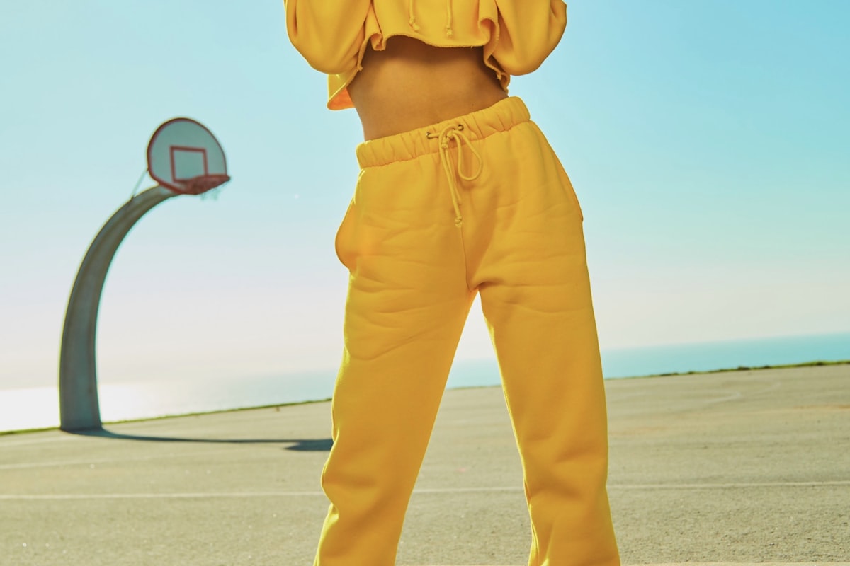 Woman wearing a peplum top that creates waist definition