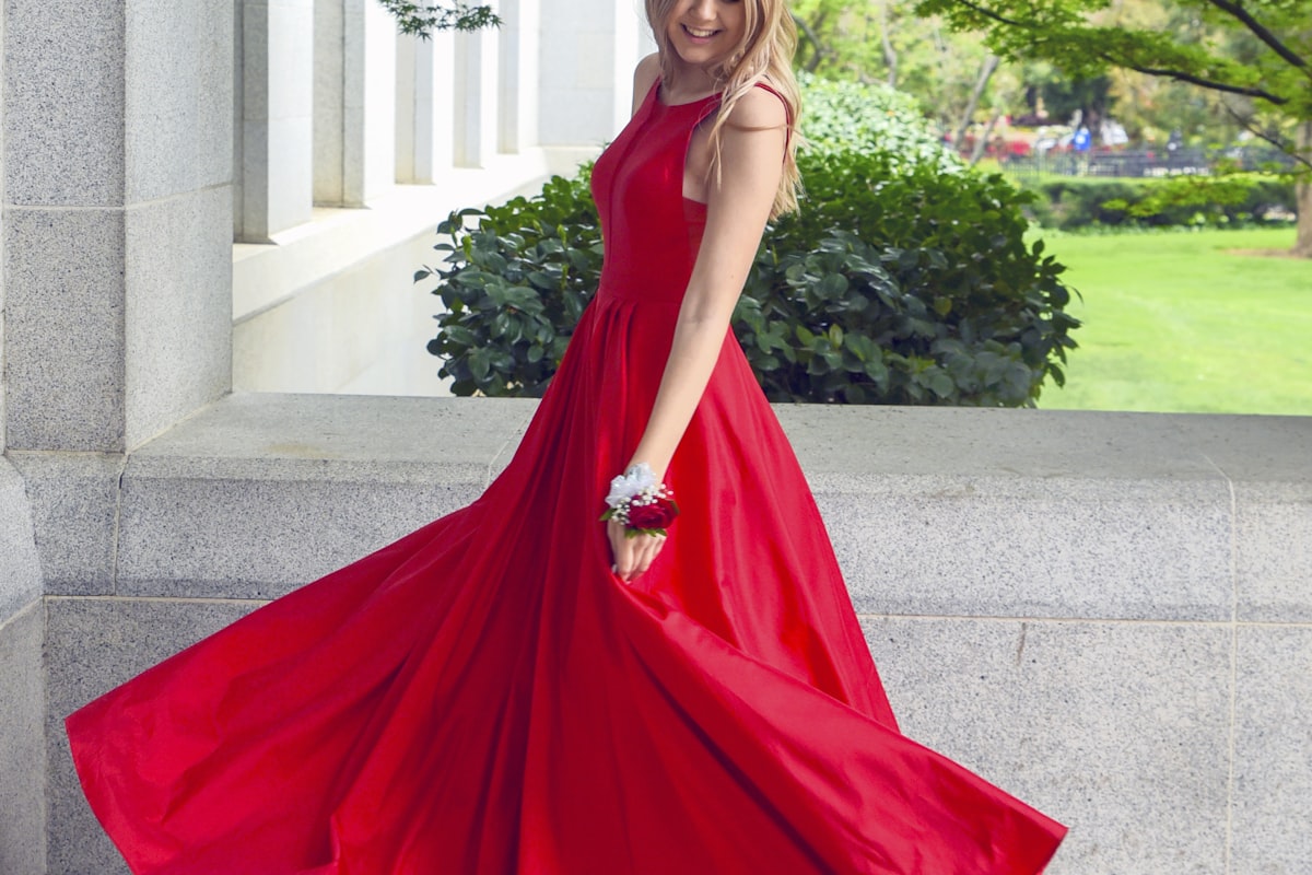 Woman wearing a wrap dress that flatters a boxy figure