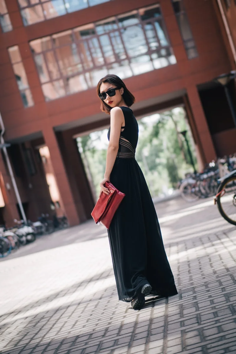 Woman wearing elegant maxi dress that showcases tall hourglass proportions