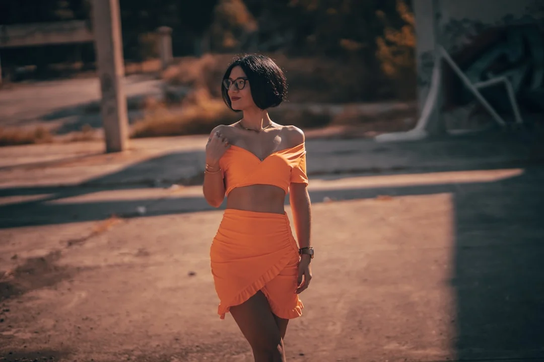 High-waisted A-line skirt outfit that adds visual weight to lower body for top hourglass balance