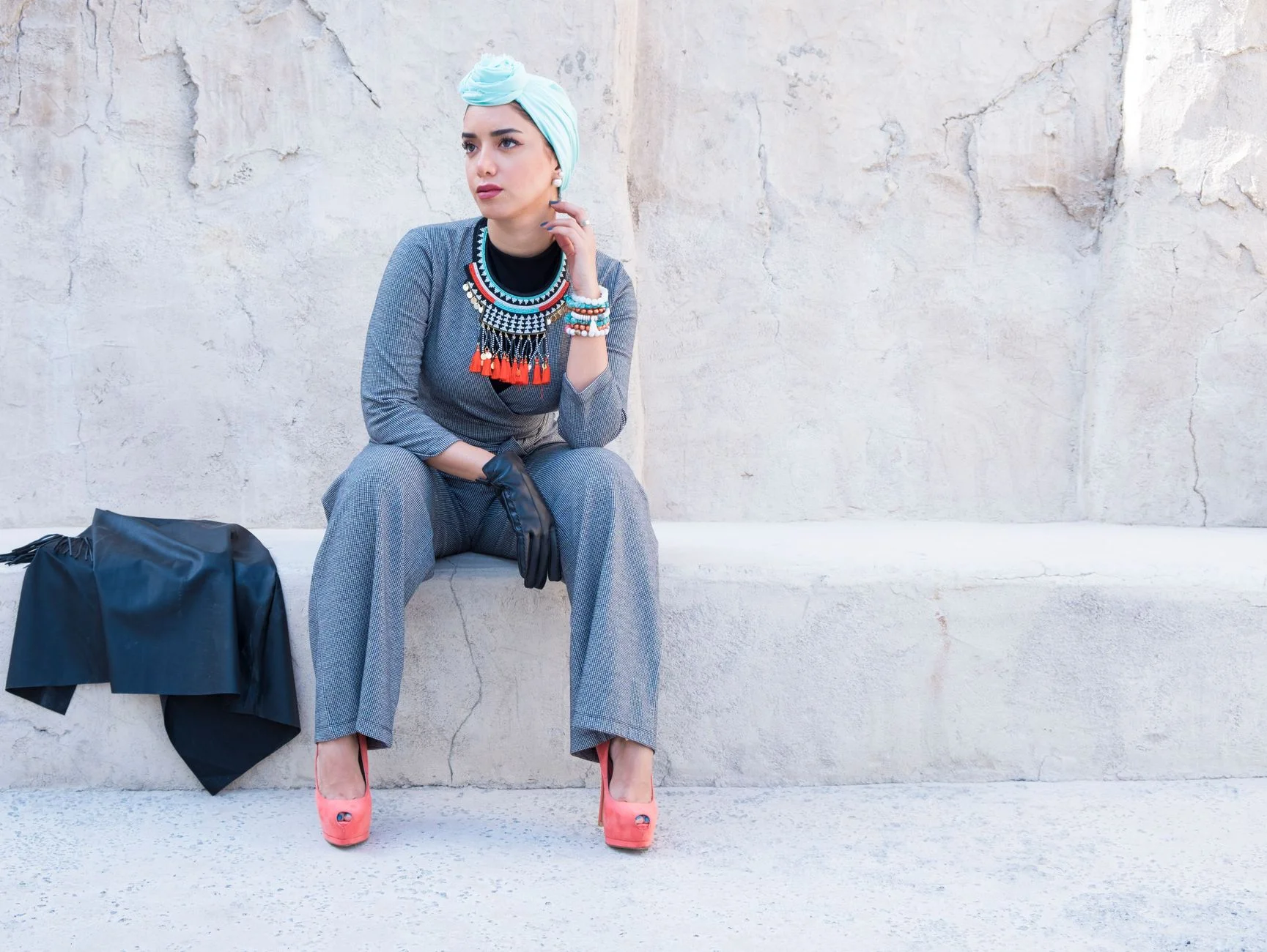 Vivid coral and turquoise outfit reflecting the warm, bright Clear Spring color palette