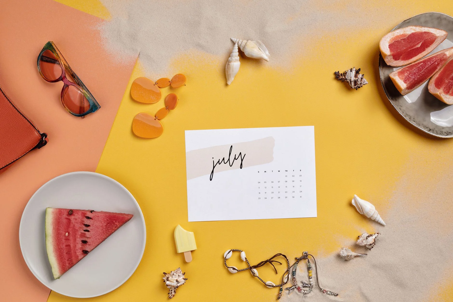 Bright emerald and hot pink accessories flatlay in Clear Spring colors
