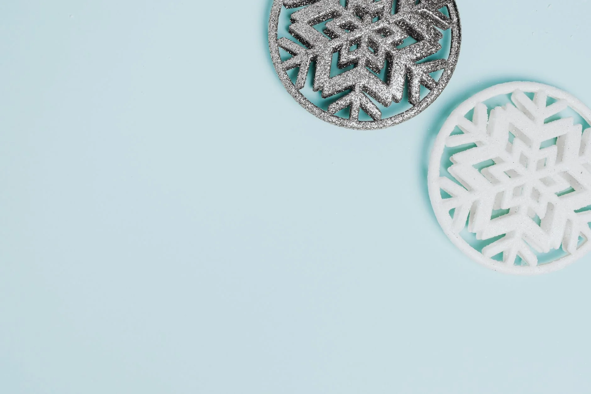 Icy pink and emerald accessories flatlay in Cool Winter colors