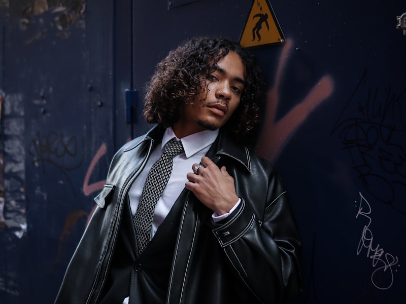 Man wearing a classic black tuxedo with a bow tie
