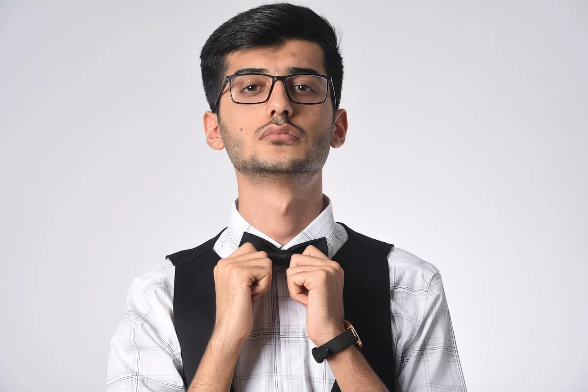 Guests in creative black tie attire with bold colors and unique details