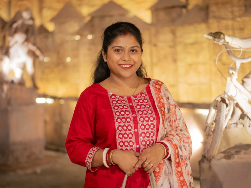 Woman wearing a festive holiday outfit with metallic accents