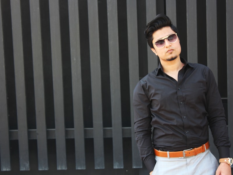 Man wearing a navy suit at a semi-formal event