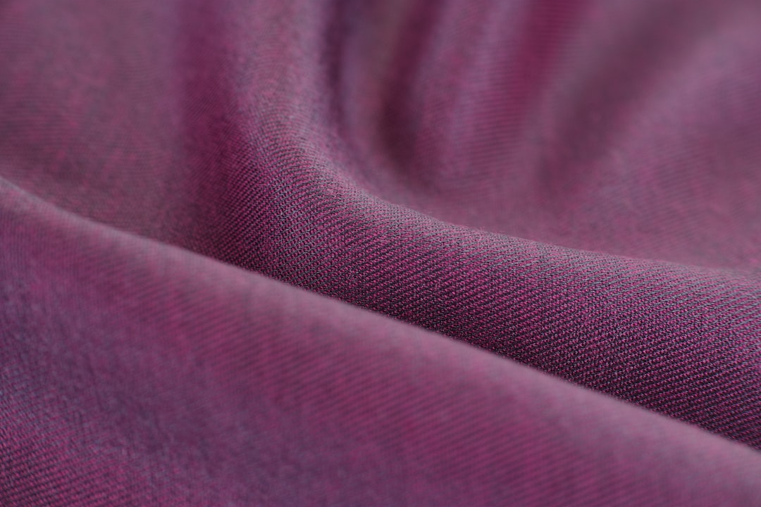 Smooth polyester fabric in a lightweight weave