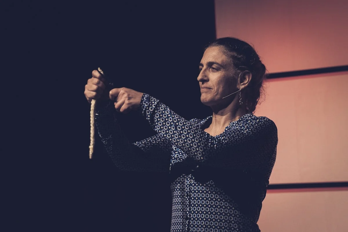 Woman using a soft tape measure to measure her face for a face shape calculation