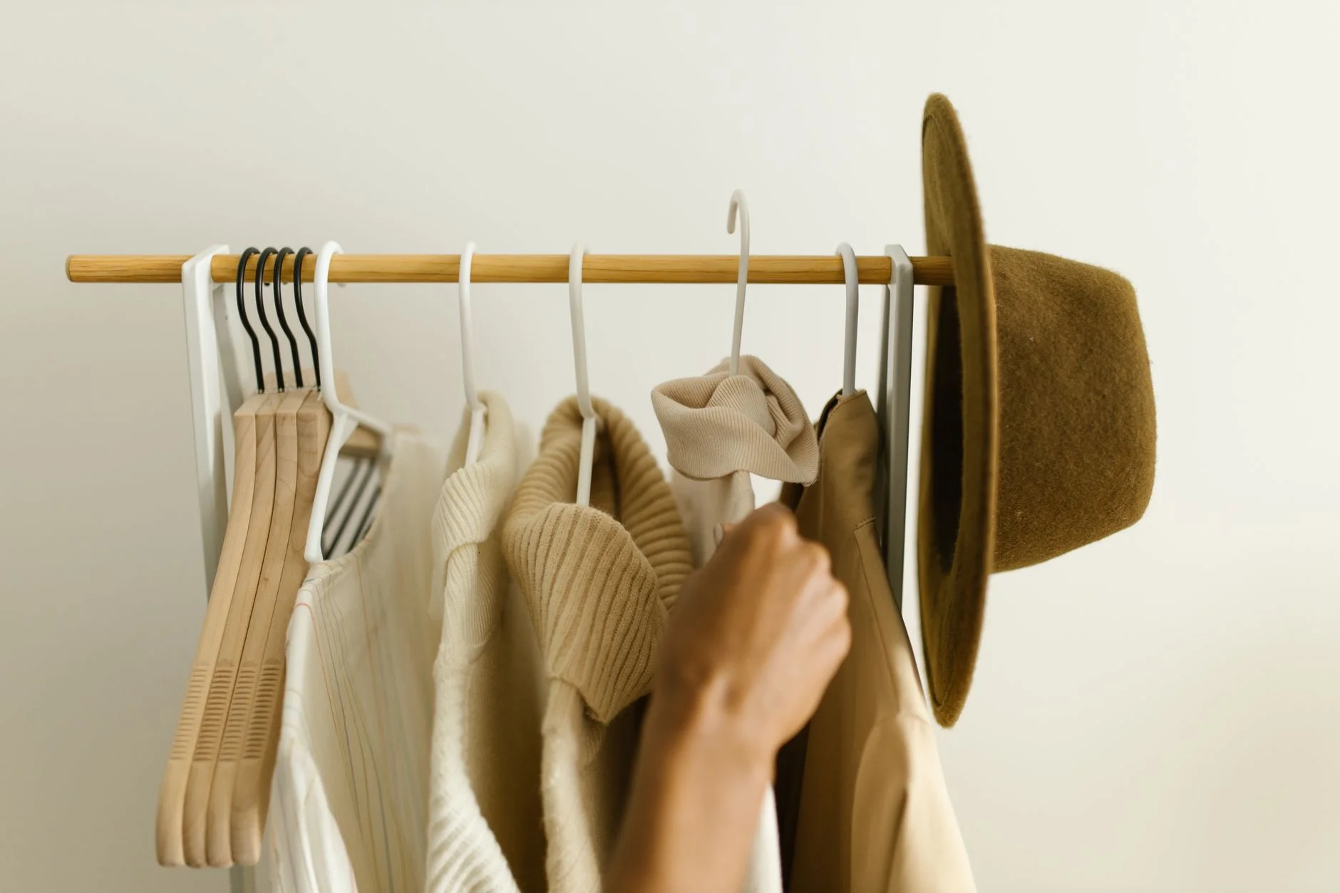 Organized closet with a curated capsule wardrobe of coordinating clothes