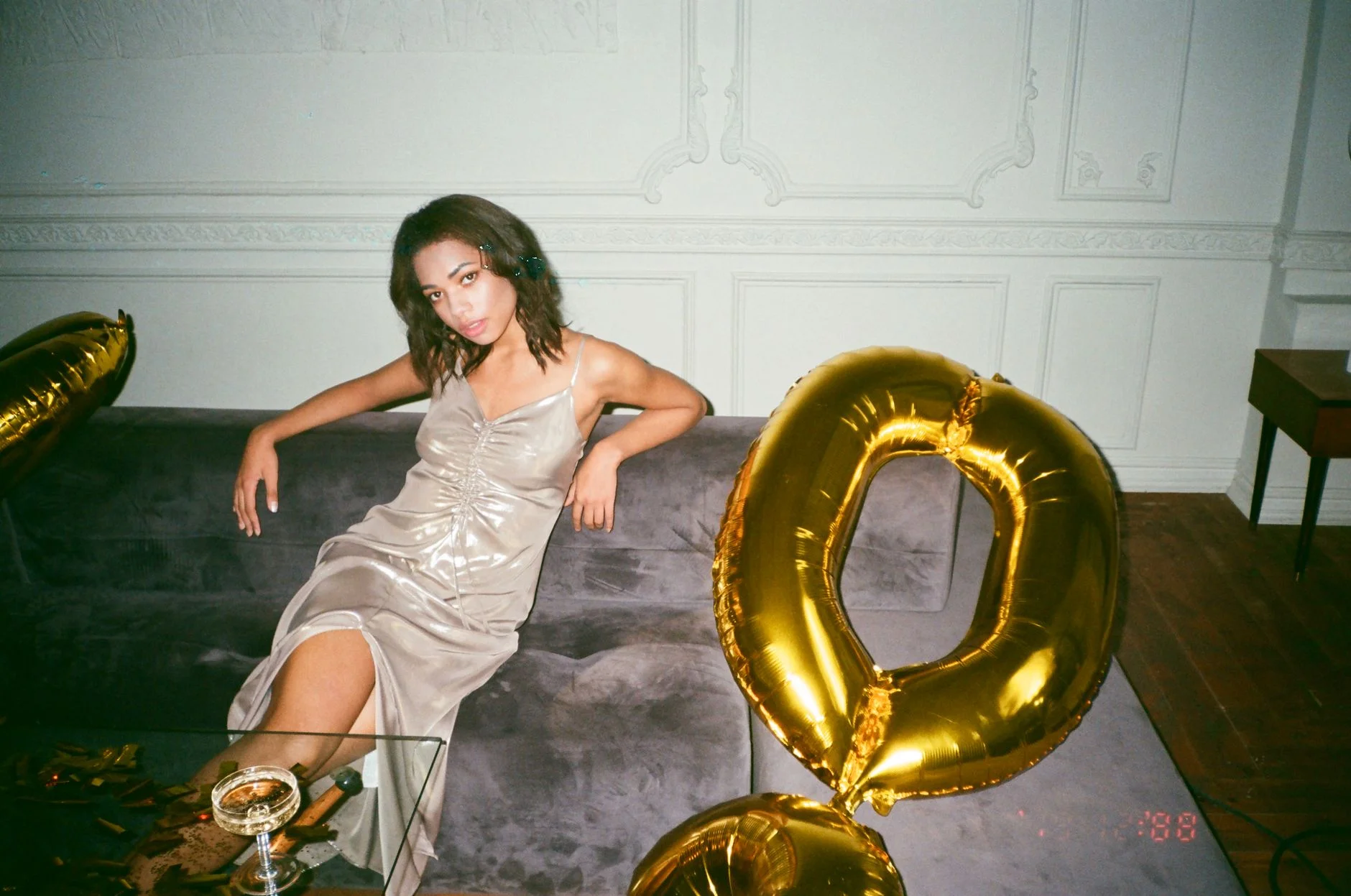 Woman in a satin slip dress birthday outfit