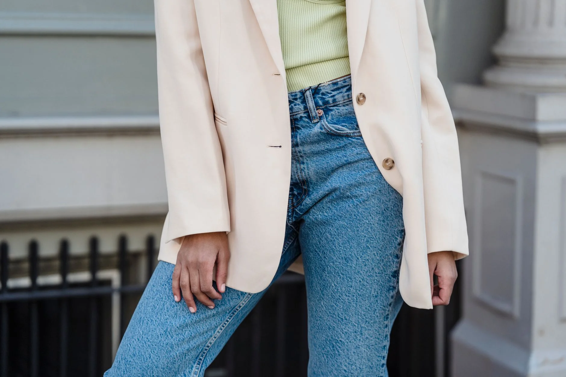 Woman in a blazer, tee, and denim everyday outfit