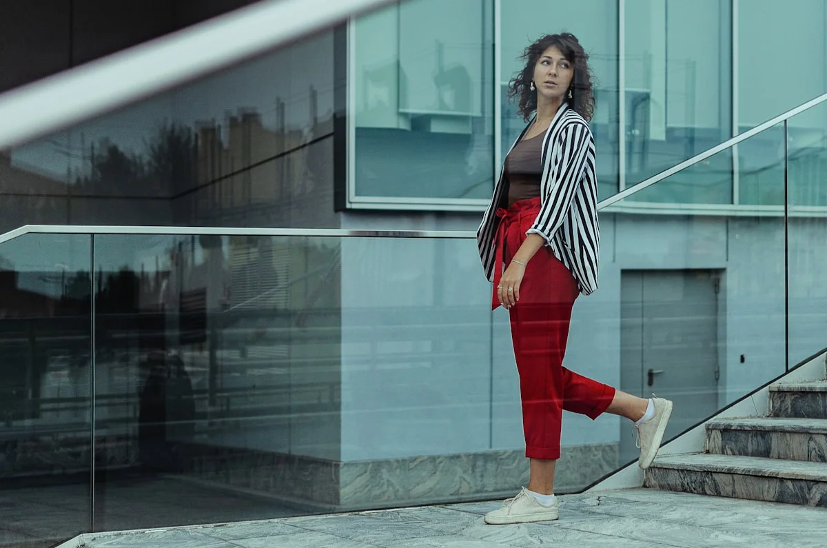 Woman in a smart casual evening outfit heading to a concert